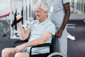 smiling senior man in wheelchair at rehabilitation 2022 05 01 23 06 11 utc.jpg